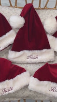 Load and play video in Gallery viewer, Embroidered Luxe Santa Hats
