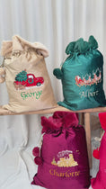 Load and play video in Gallery viewer, Deluxe Embroidered Santa Sack - Reindeer
