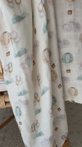 Load and play video in Gallery viewer, Dreamy Skies - Organic Muslin Swaddle
