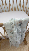 Load and play video in Gallery viewer, Whimsical whales - Organic Muslin Swaddle
